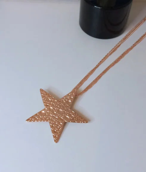 Gold star necklace