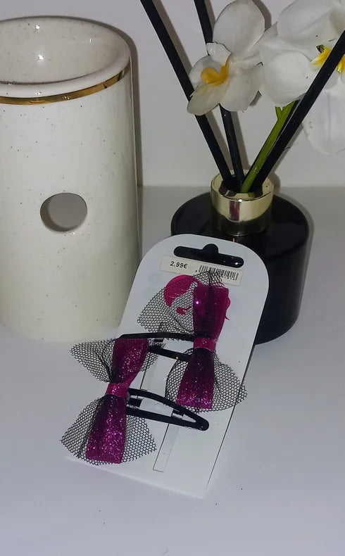 Fuchsia sequin bow clip