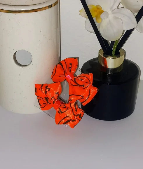 Neon orange bow clip