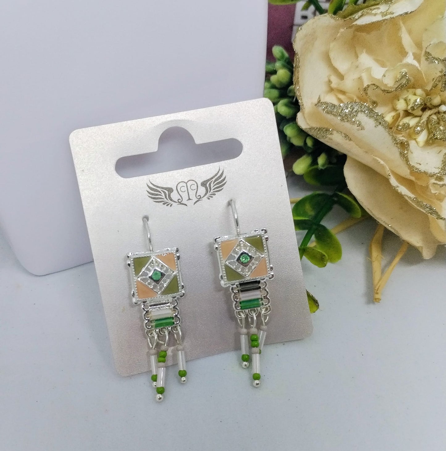 Green sleeper earring